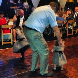 dancing with grandpa at a wedding