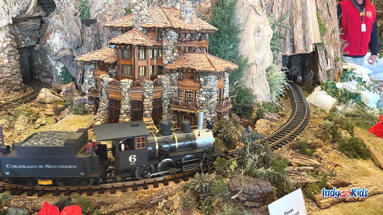 Jingle Rails Indianapolis at the Eiteljorg takes visitors on a train journey through the American West.