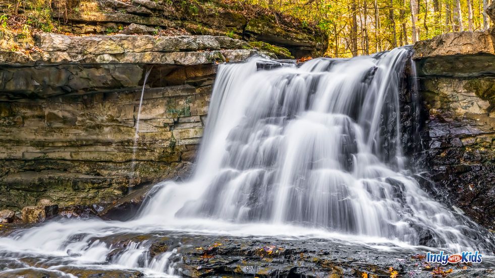 Camping Indiana: A waterfall cascades over the rocks at McCormick's Creek State Park.