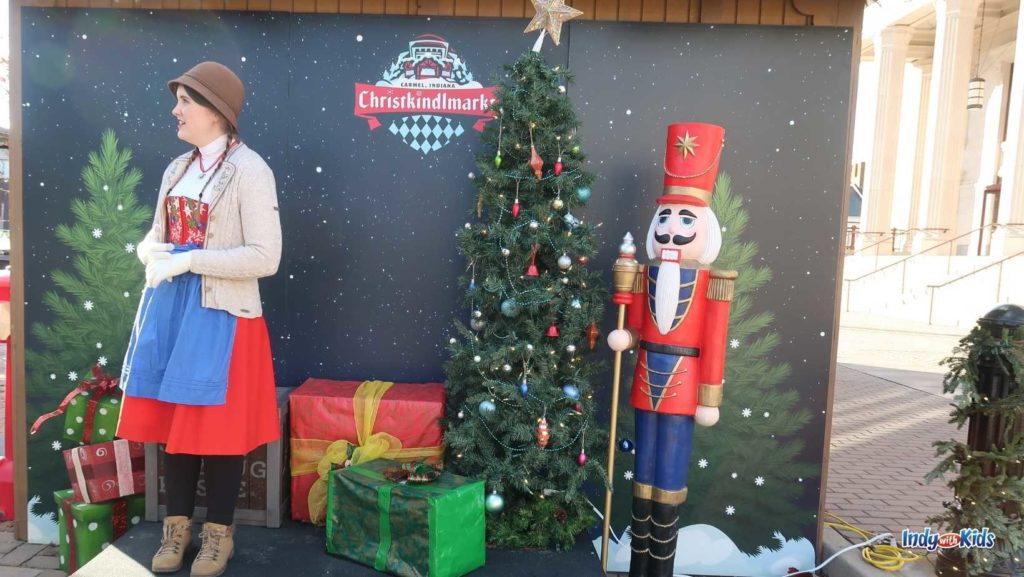 a photo set up with a nutcracker, Christmas tree, and presents at the Carmel Christkindlmarkt