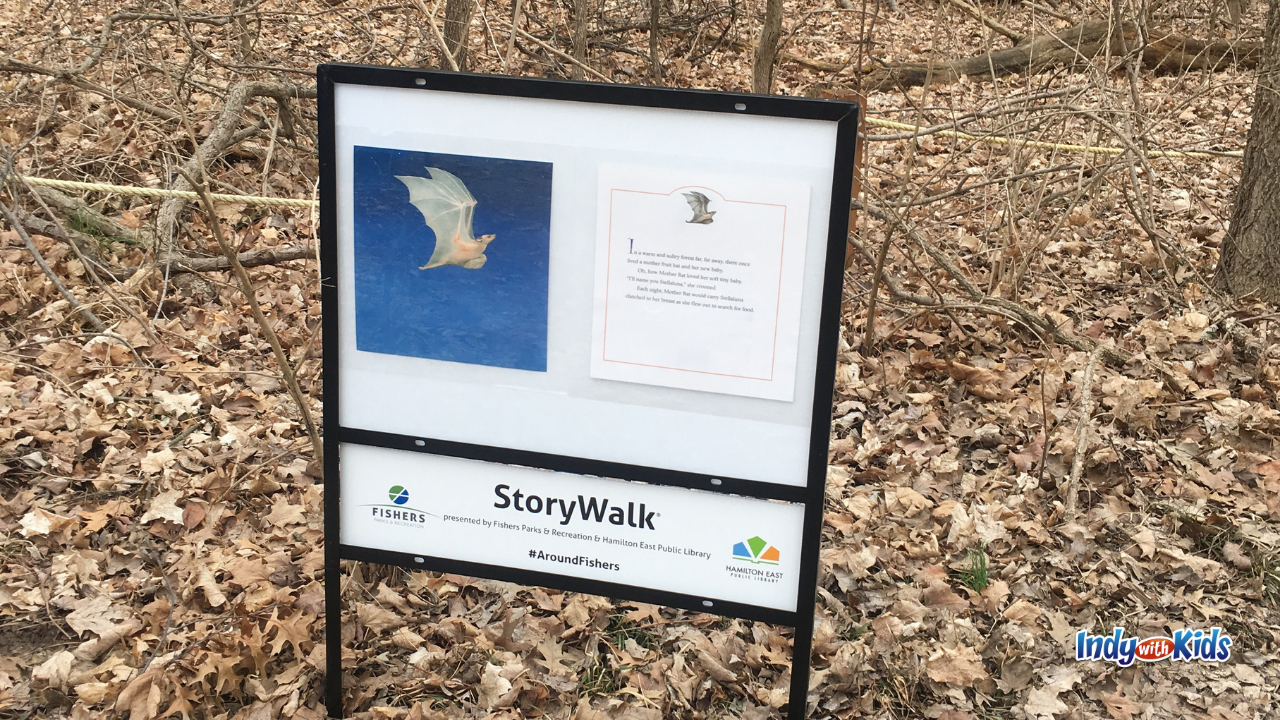 Story Walk Near Me: A sign displays illustrations and words from the storybook Stellaluna at a Fishers StoryWalk location.