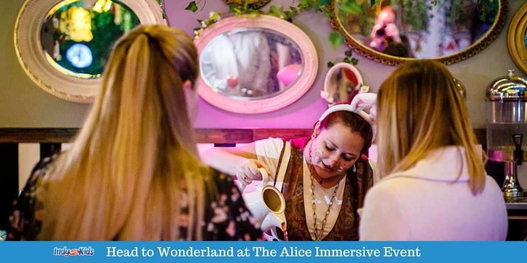 alice in wonderland themed bar with two guests