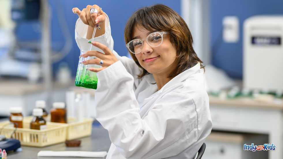 BU_ BeReal Female Student doing Science in college lab
