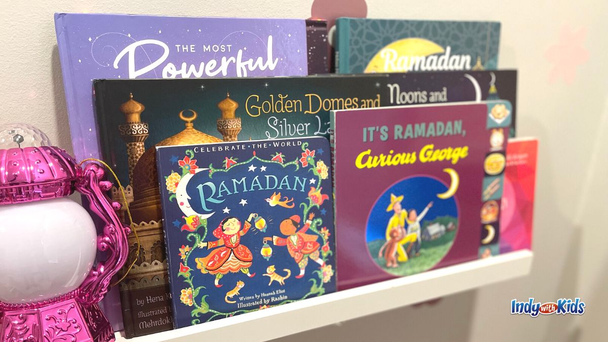 Ramadan Activities: Several children's books about Ramadan face outwards on a shelf.