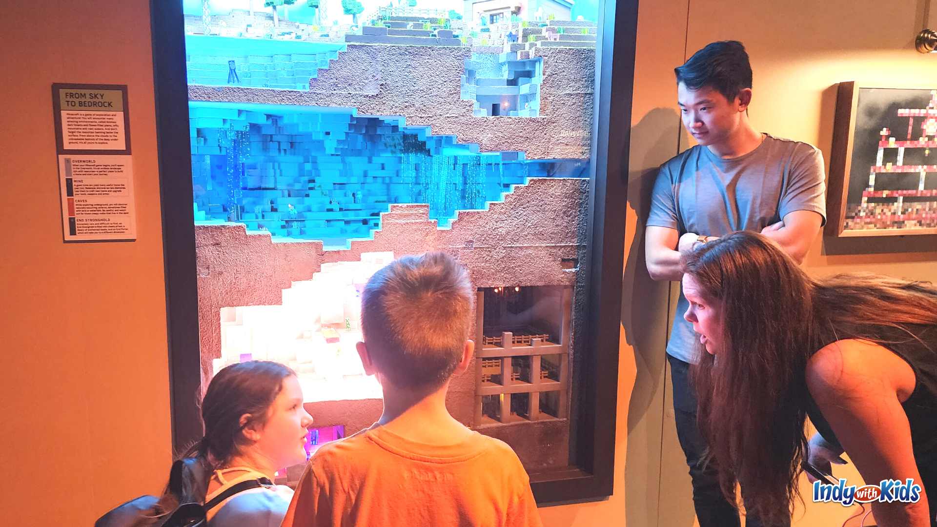 Minecraft: The Exhibition at The Children's Museum of Indianapolis explaining the game to newbs