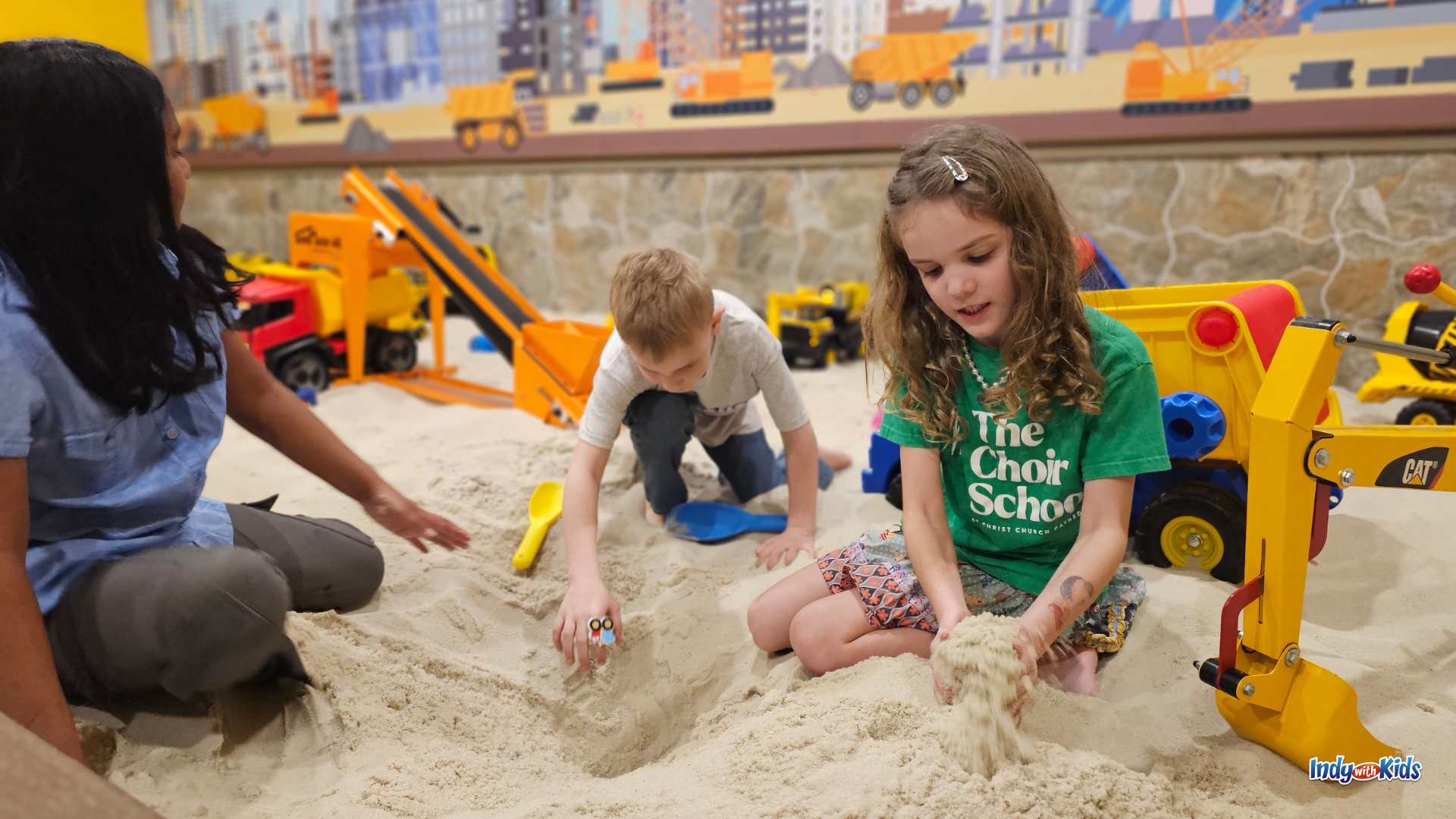 Children digging and building together at Dig Dig for Kids