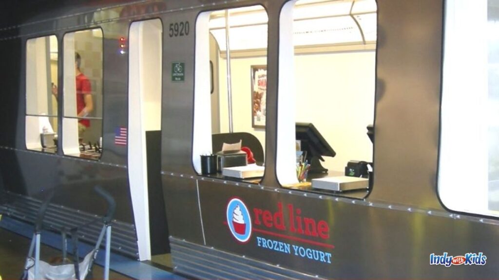 a silver train car now houses the red line frozen treats store