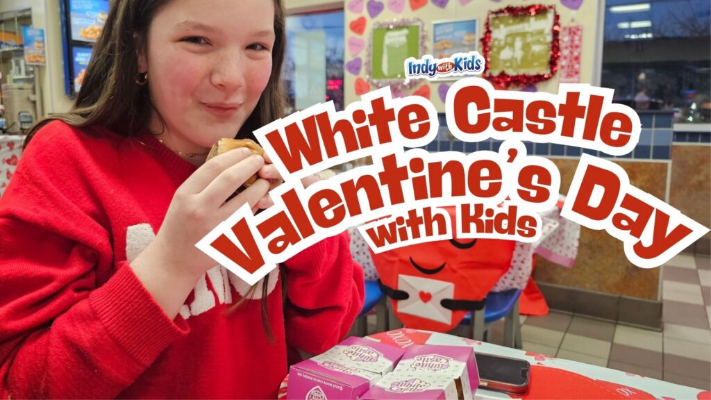Girl at white castle restaurant on valentines day in red sweater with hamburger sliders