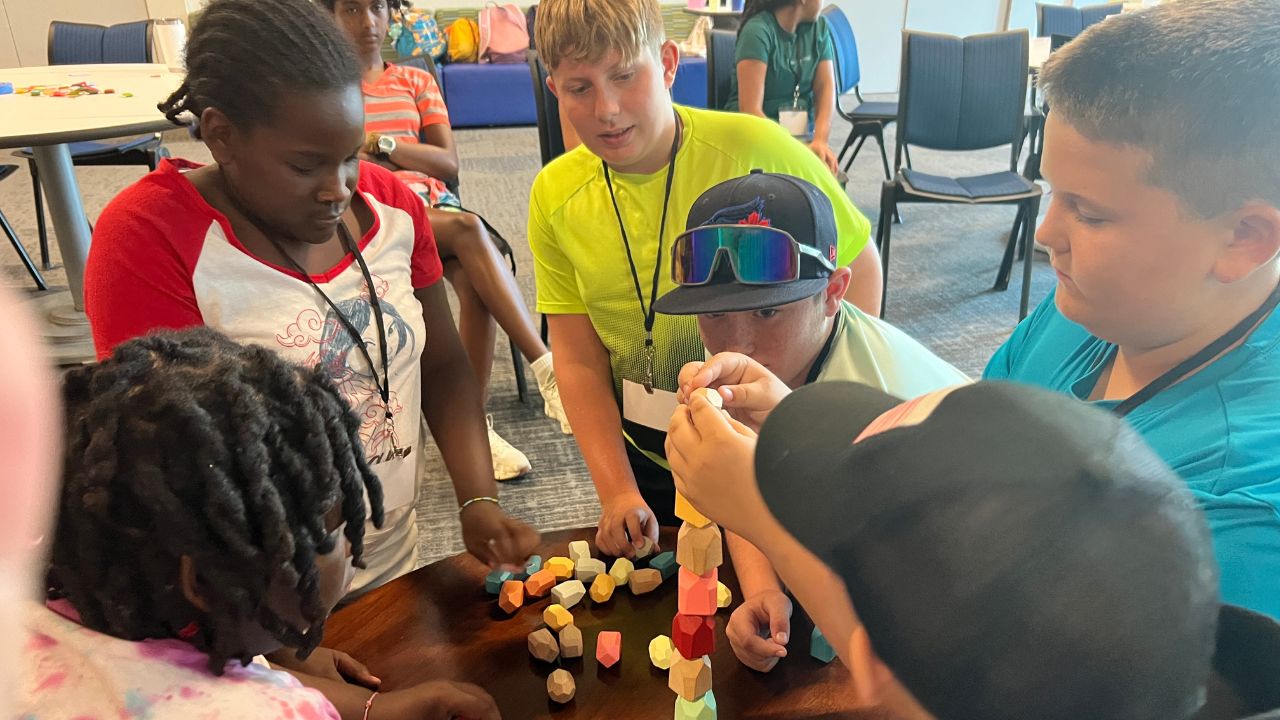 Buter Discovery Camps Kids building with blocks