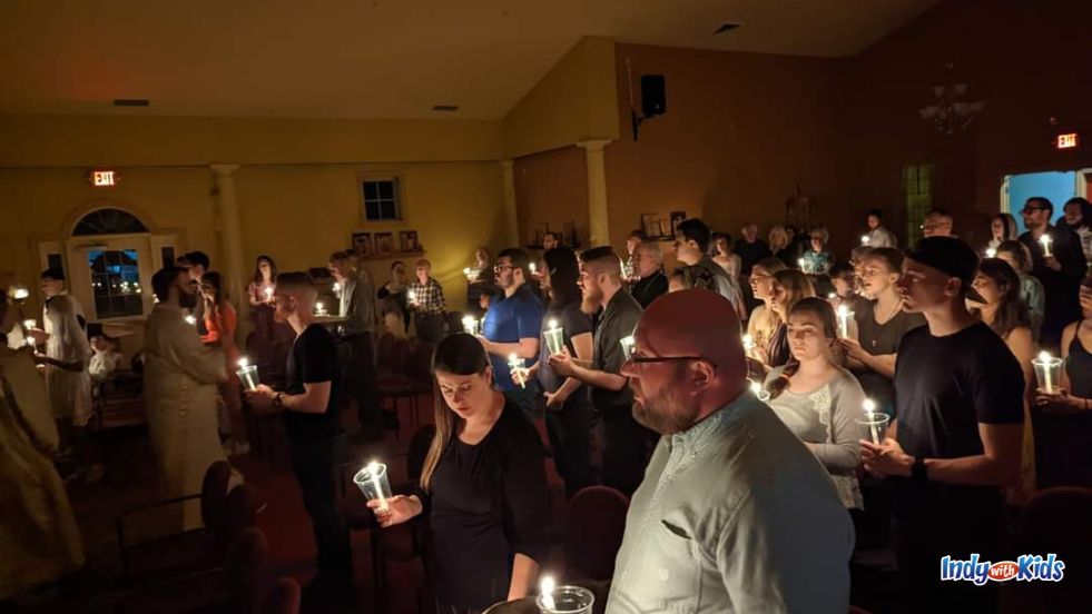Worshippers hold candles at a midnight celebration of Pascha in the Orthodox Church.