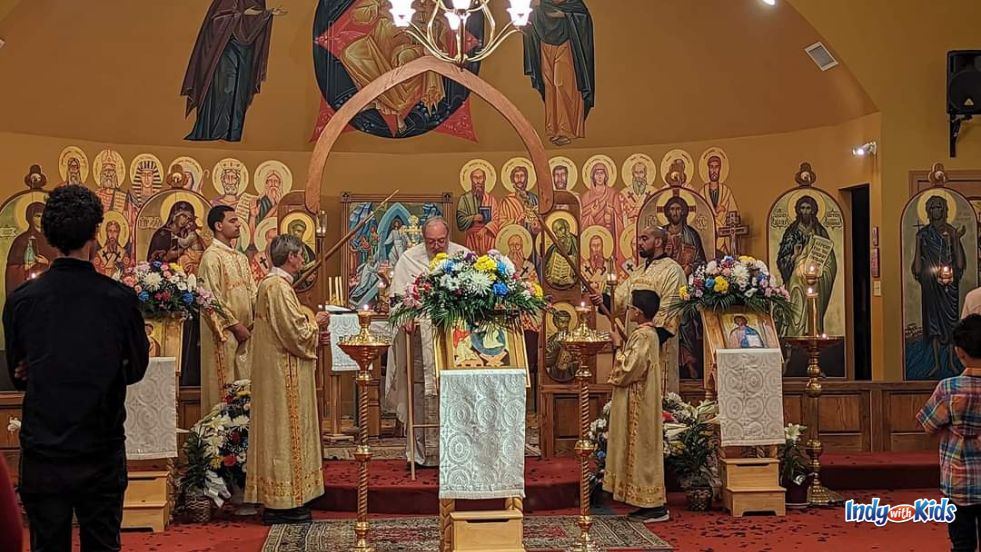 Flowers adorn the altar at a Pascha service at an Orthodox Church.
