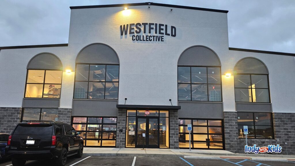 Exterior of Westfield Collective, a large white building with black trim and arched windows.