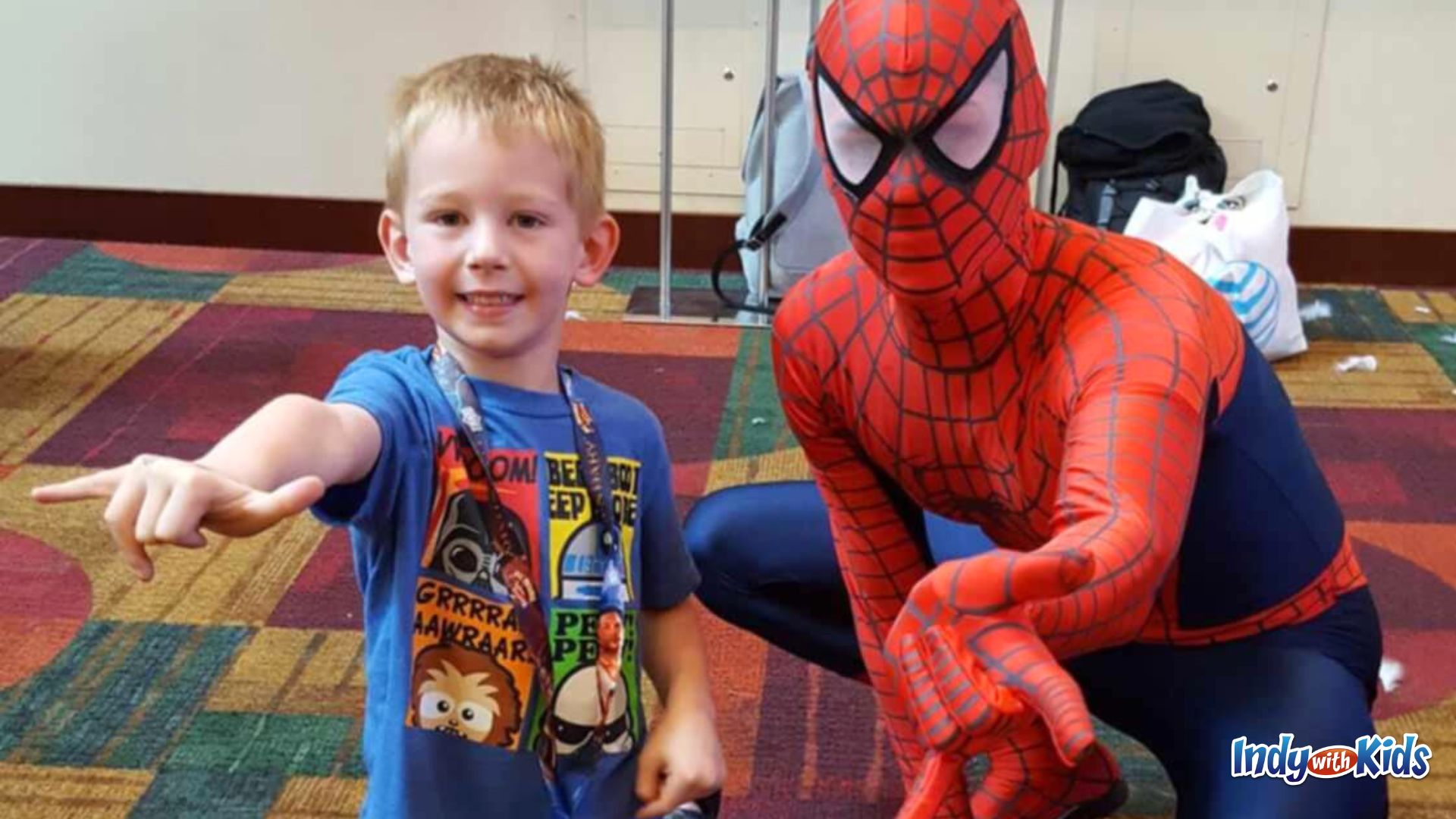 Gen Con with Kids: A boy poses with Spiderman at Gen Con in Indianapolis.