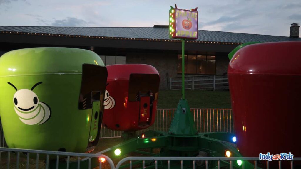 Headless Horseman Conner Prairie Festival: apple spinners in red and greet are one of two carnival rides at the festival