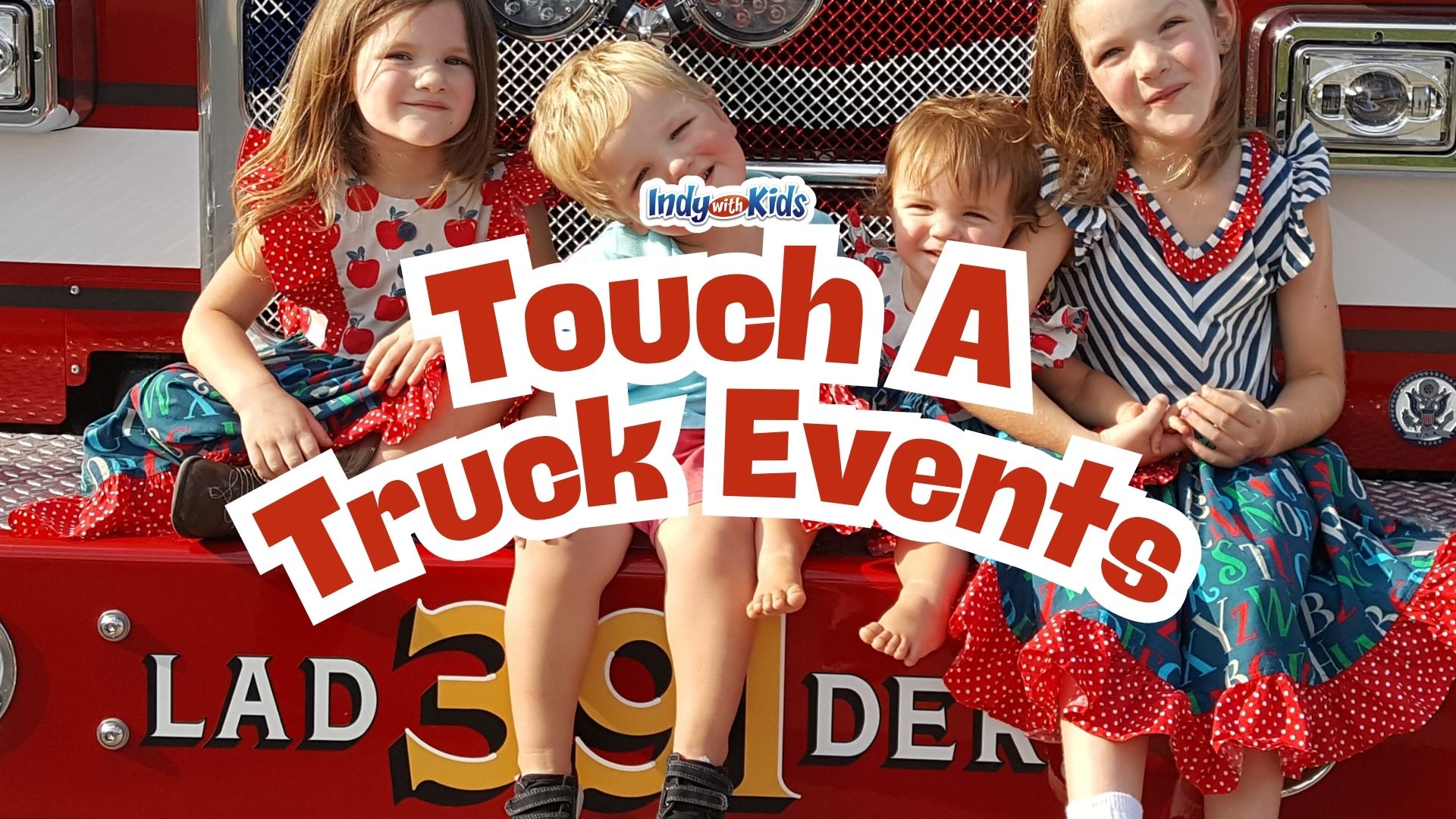 Four smiling children sit together on the front bumper of a red fire truck during a Touch-a-Truck event. The image has a text overlay that says “Touch A Truck Events.”