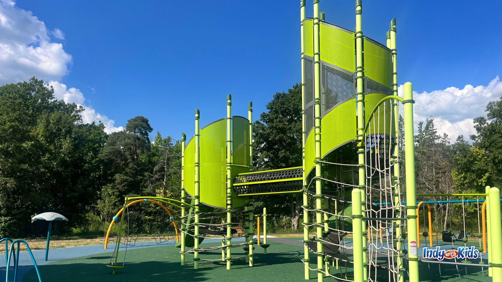 The new playground at Washington Park in Indianapolis features brightly-colored, modern climbing equipment.