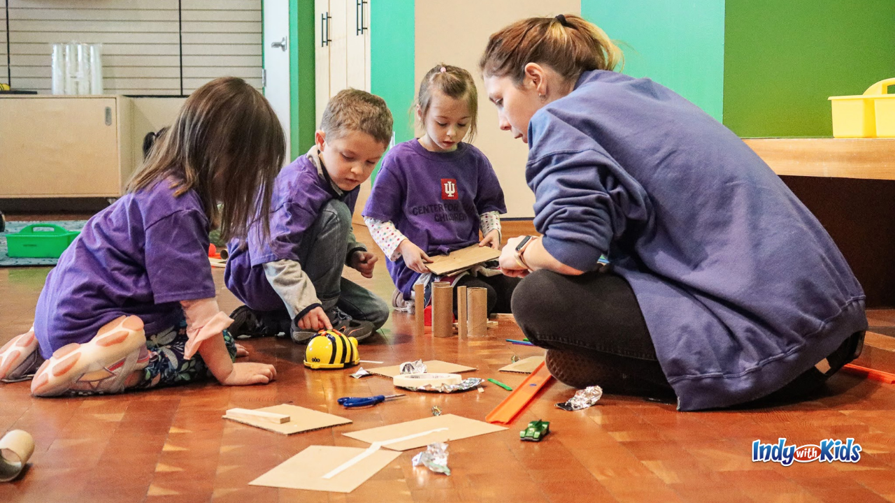 IU Indianapolis’ Center for Young Children - kids playing a game with caretaker